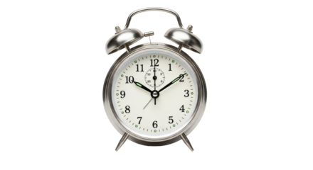 Isolated old fashioned alarm clock ticking past ten o'clock and fifteen minutes time