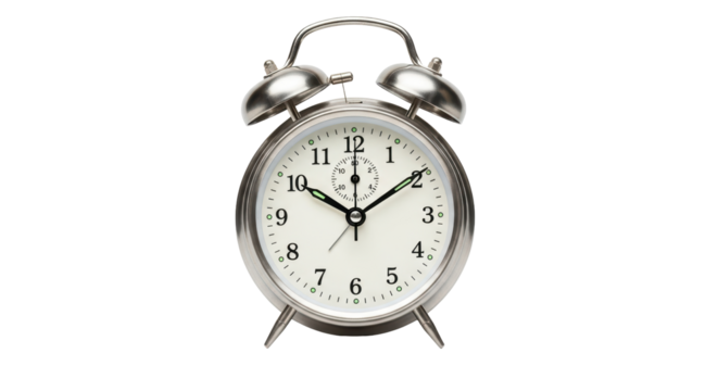 Isolated old fashioned alarm clock ticking past ten o'clock and fifteen minutes time