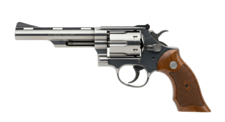 Isolated gun in profile, silver revolver with walnut grip, handgun for personal protection