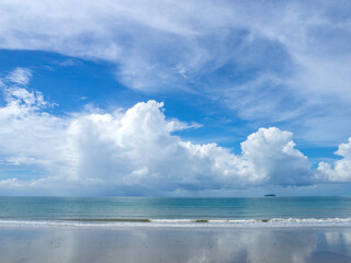 Beautiful Sky with Clear Blue and Puffy Clouds on the Sea