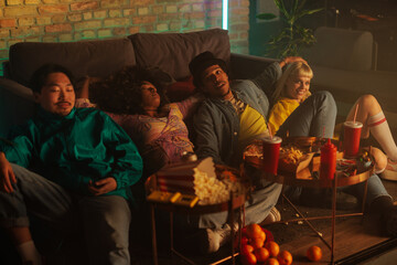 Friends relaxing after dinner.