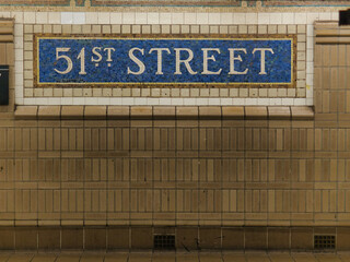51st Street Subway Station Sign - A detailed shot of the tiled mosaic sign for the 51st Street subway station in New York City, a classic example of urban transportation design.