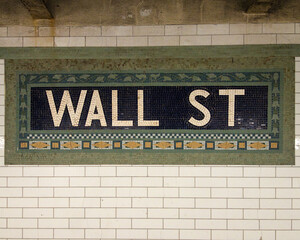 Wall Street Subway Sign - A tiled mosaic sign for the Wall Street subway station in New York City, a key financial district and historic urban landmark.