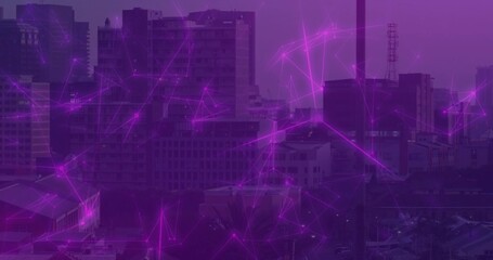 Displaying network overlay streaming across city skyline at dusk, with towers, chimney and mast