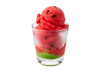 Vibrant red watermelon sorbet, layered in a chilled glass, displays a refreshing summer treat.