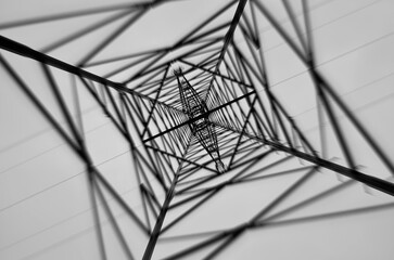 Gazing up at a captivating black and white photo of a power tower
