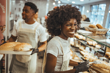 Smiling Staff Working in a Bakery Preparing and Serving Freshly Baked Bread