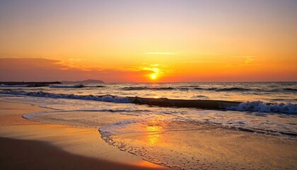 Serene Sunrise Over Ocean Beach: Towel and Book on Sand