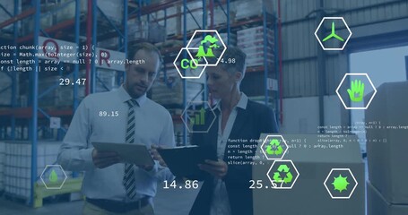 Logistics coworkers using tablets reviewing floating data icons shifting around warehouse racks - Powered by Adobe