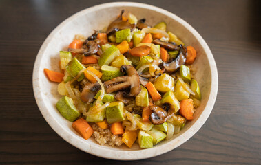 A cozy fall-inspired quinoa bowl filled with roasted vegetables, served warm and fresh