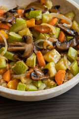 A cozy fall-inspired quinoa bowl filled with roasted vegetables, served warm and fresh