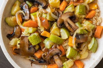 A cozy fall-inspired quinoa bowl filled with roasted vegetables, served warm and fresh