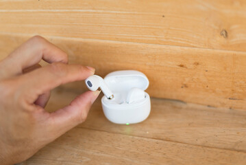 Closeup to show wireless earbuds for smartphone