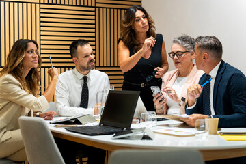 Business people working together in modern office meeting room