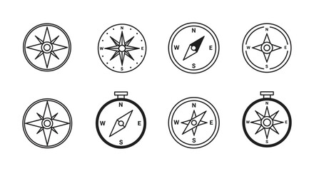 Collection of various black and white compass icons and navigational tools © Lhvect02