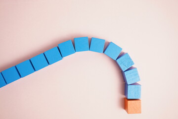 A circular path led by a different piece of wood, symbolizing leadership style and diversity.