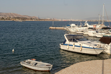 Fototapeta premium View of the small embankment and moored boats close-up