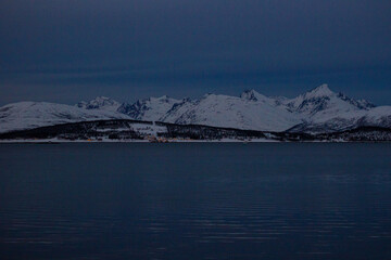 Tranquil Bay of Telegrafbukta Framed by Snowy Peaks and Dark Arctic Sky, Tromsø, Norway