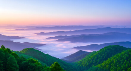 Fototapeta premium Misty mountain peaks at sunrise with soft pastel sky