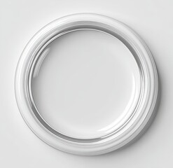A high-angle, full shot of a circular, white frame.  The frame is three-dimensional, with concentric rings creating a raised, sculpted look.  The inside of the frame is smooth and appears glossy.  