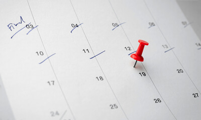 Red pin on calendar. concept of appointment important date notification an appointment with your...