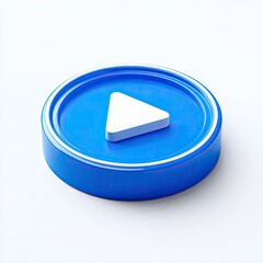 A 3D rendered, bright blue circle button with a white play icon.  The button is raised, with a recessed, slightly lighter blue inner ring.  A white triangle sits centrally, indicating play.  