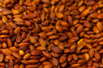 Spicy paprika roasted almonds. Aromatic roasted almonds. Crunchy almonds. Spicy nuts. Lots of roasted almonds with barbecue and paprika flavor.