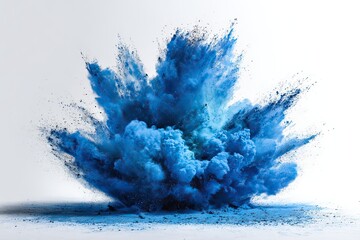 Vibrant blue powder explosion on white