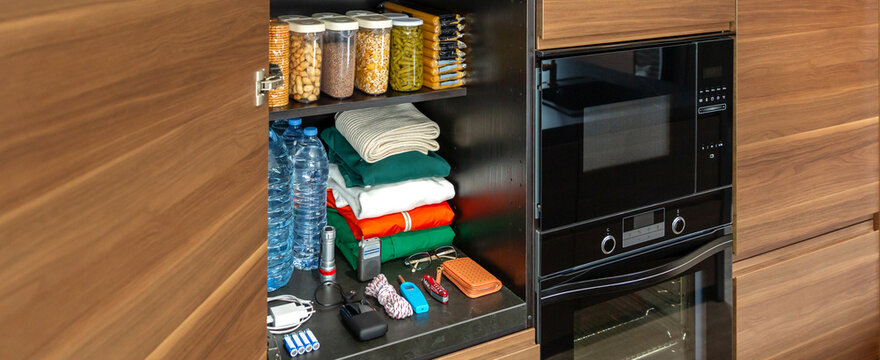 Banner of stocked food in kitchen pantry ready for self sufficiency in emergencies or food shortages