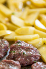 Meatballs and patatoes raw food