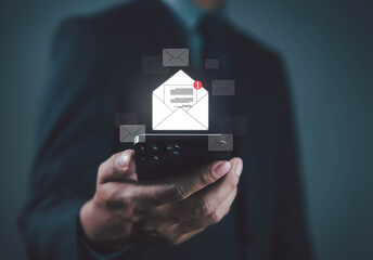 Email notification concept with glowing envelope icon on smartphone, symbolizing digital communication, inbox alert, business message, online correspondence, and instant mobile connectivity.