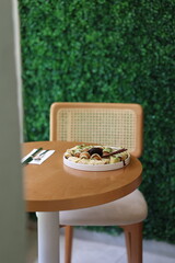 Assorted Fruits and Desserts on Elegant Plate 