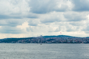 Istanbul, Turkey. Scenic view of the Bosphorus Strait with city view in the background. Urban skyline and city life.