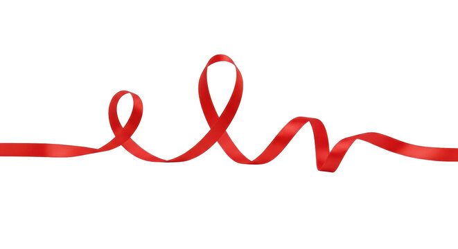 Isolated red ribbon elegantly looping, conveying festive celebration and decorative embellishment