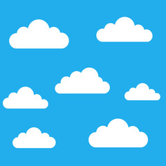 Obraz premium Collection of fluffy white cartoon clouds scattered across a vibrant clear blue sky background