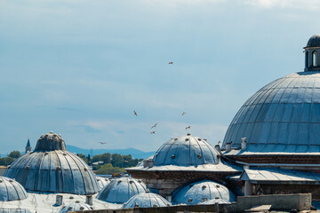 Obraz premium Istanbul, Turkey. Dome of the roof of the Süleymaniye Mosque. The Sultan Suleiman mosque and tomb are located on the Third Hill in Istanbul. Islamic architecture.