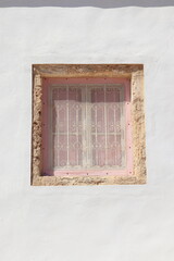 Fototapeta premium House Facade Window with Window Grill in Erriadh, Tunisia