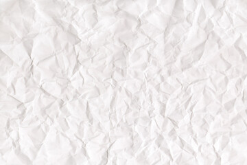 Crumpled paper texture background. White Wrinkled backdrop. Distressed sheet background with folds and wrinkles