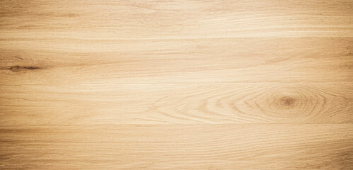 Fototapeta premium A light brown wooden surface shows wood grain and subtle color variations, enriched with natural textures and a warm organic atmosphere for design use.