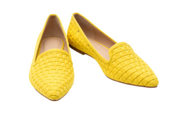 A pair of yellow woven leather loafers isolated on transparent background