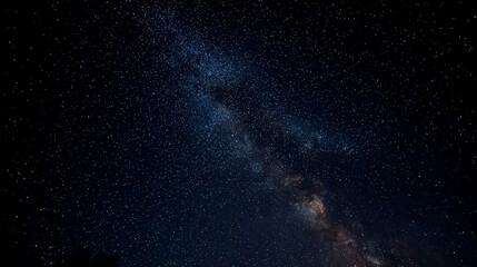 Obraz premium Night sky filled with stars and the Milky Way galaxy