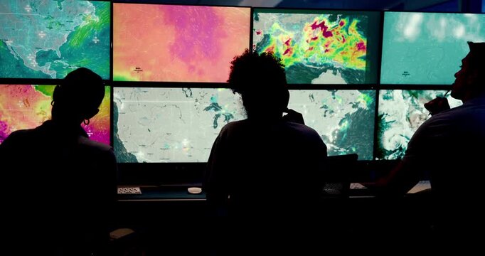 Computer, screen and people with ecology, office and broadcast for news research. Discussion, silhouette and weather team with forecast for meteorology report, satellite map or climate change update