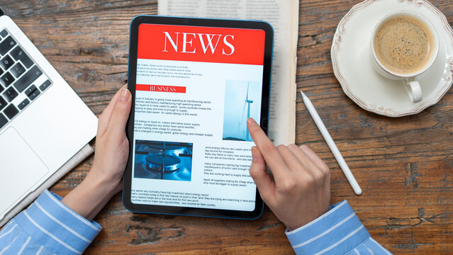 business woman using tablet pc for reading news - Powered by Adobe
