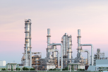 Petrol chemical plant in Map Ta Phut Industrial Estate with dusk sky background. Heavy industry to processing, manufacturing petroleum products i.e. diesel fuel and gasoline.