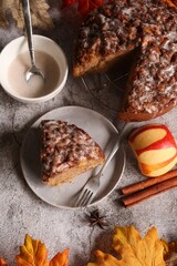 Homemade Apple fritter bread or loaf with cinnamon glaze and strusel topping, selective focus
