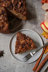 Homemade Apple fritter bread or loaf with cinnamon glaze and strusel topping, selective focus