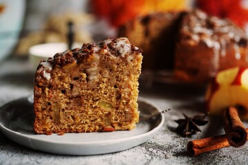 Homemade Apple fritter bread or loaf with cinnamon glaze and strusel topping, selective focus