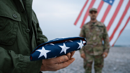 Fototapeta premium The Military Salute For Memorial Day At The Beach