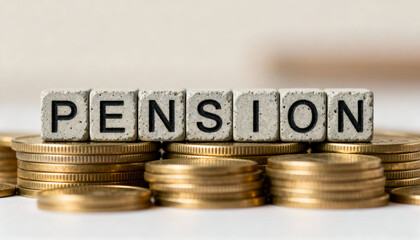 Stacked coins and concrete textured blocks showing PENSION text, financial savings idea