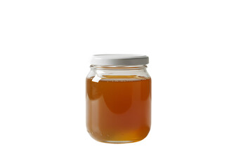 Golden Natural Honey in Glass Jar with White Lid on Black Background. Pure Sweetener Product for Food and Wellness.
